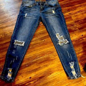 VIP women’s jeans size 7/8 distressed
